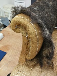 Détail crosse accotoir après